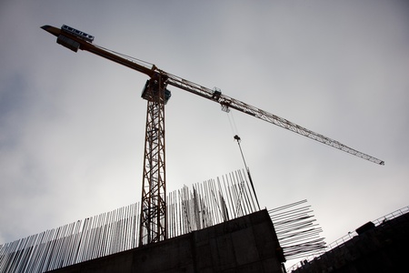 Construction crane with concrete barsの写真素材