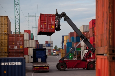 Container forklift loading m the truckのeditorial素材