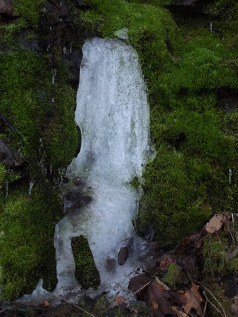 ice on a rock at Sec dam in eastern Bohemiaの写真素材