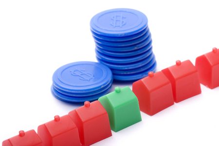 several sheets of small houses surrounded by dollarの写真素材