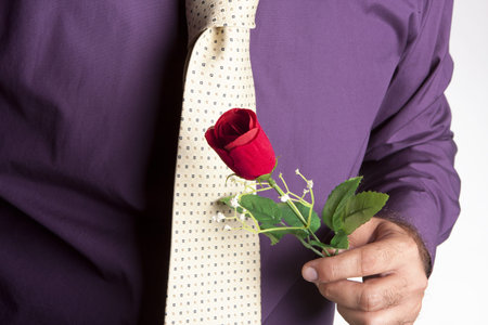 a man with a rose gift for his beloved
