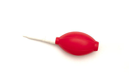 a small red and white enema