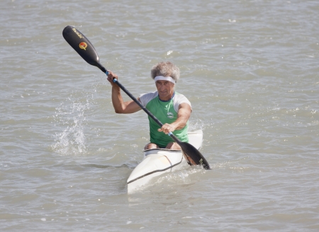 PUERTO REAL, JUNE 09: Arrival of an unidentified canoeist in the veterans category in the championship race canoes Andalucia. June 09, 2012 in Puerto Real, Cádiz (Spain) のeditorial素材