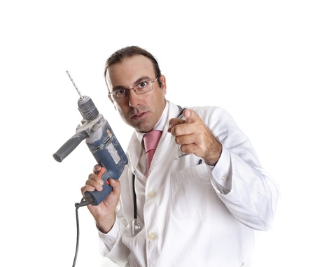 a crazy doctor with a drillの写真素材