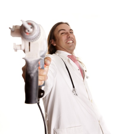 a crazy doctor with a drillの写真素材