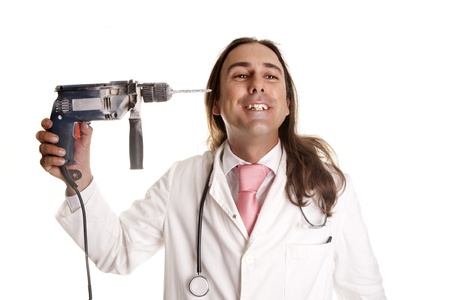 a crazy doctor with a drillの写真素材