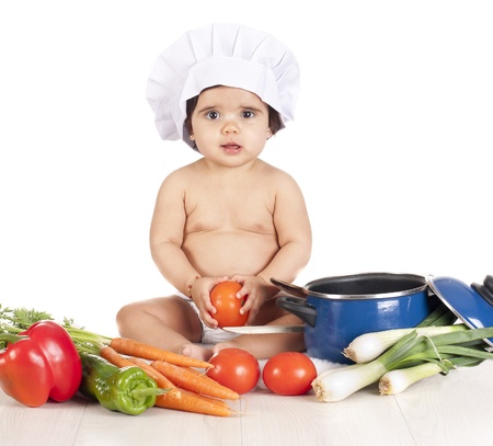 a small chef, preparing delicious and healthy foodの写真素材
