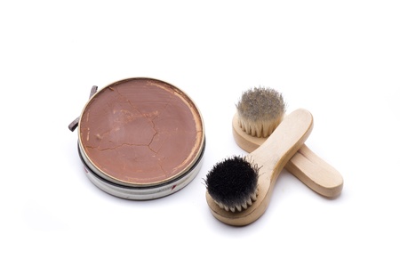two brushes and a pot of grease to clean leather shoesの写真素材
