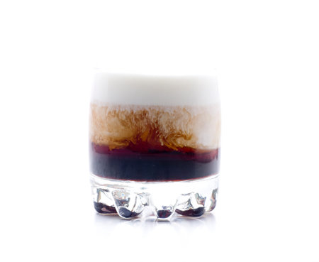 a cocktail made up, vodka, coffee liqueur and cream