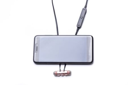 Bluetooth headphones to connect with a smartphoneの写真素材