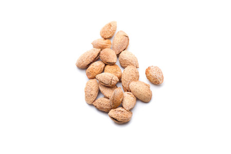 freshly harvested almonds, some of the nuts with more vitamins
