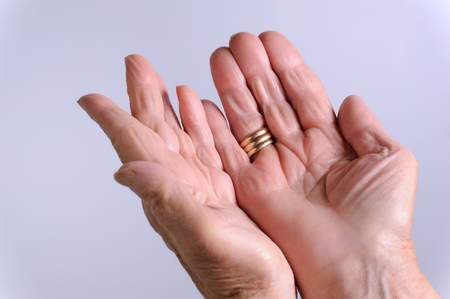 close up of open hands of elderly womanの写真素材
