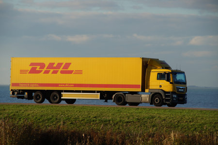 DHL delivery truck at dusk