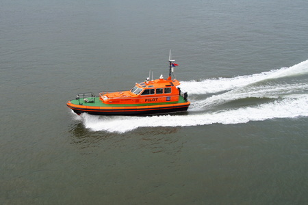 Pilot boat Collingwood passing town in the Port of Tyne in the city of North Shieldsのeditorial素材