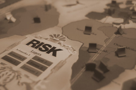 Risk board game black and white (selective focus closeup)