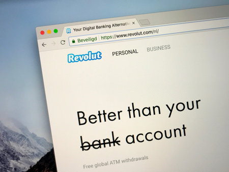 Amsterdam, the Netherlands - August 24, 2018: Website of Revolut, a digital banking platform for...