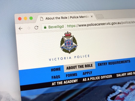 Amsterdam, Netherlands - June 17, 2018: Website of the Victoria Police force, a Australian state police agency.のeditorial素材