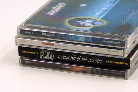 Amsterdam, The Netherlands - February 8, 2019: Compact Disc (CD) Albums from American rock band Incubus.のeditorial素材