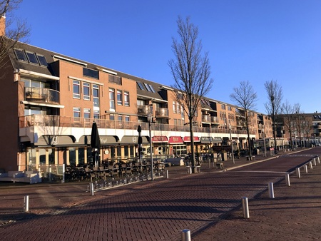 Almere Haven, Flevoland, the Netherlands - February 15, 2019: Apartment building and restaurants in the city of Almere Haven (Sluidkade).のeditorial素材