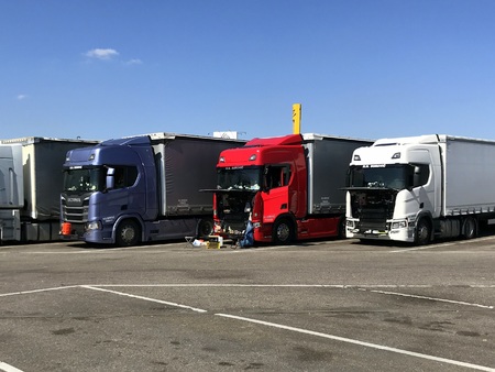 Merklingen, Baden-W?rttemberg, Germany - April 19, 2019: Trucks with an open hood and recreational equipment on a public parking lot.のeditorial素材