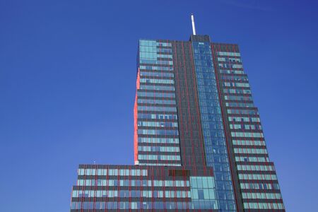 Almere Stad, the Netherlands - September 1, 2019: World Trade Center Almere against a clear blue sky.のeditorial素材