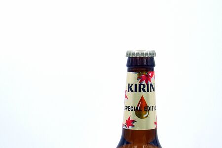 Tokyo, Japan - October 13, 2019: Bottleneck of a Kirin Ichiban beer bottle.のeditorial素材
