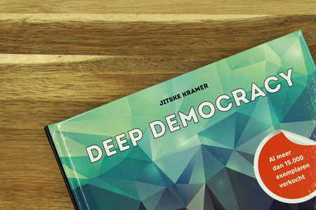Amsterdam, the Netherlands - April 2, 2020: Book cover of Deep Democracy by Jitske Kramer, against a...