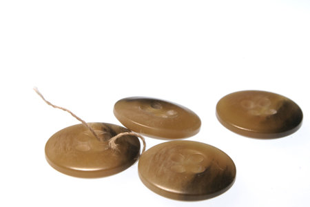 Four buttons against white background