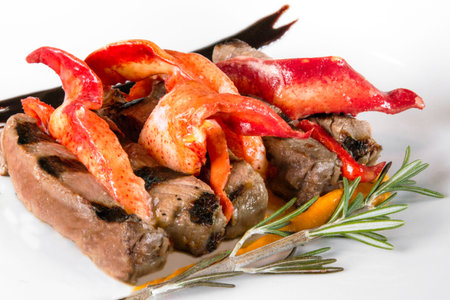 A creative plating of steak and lobster claw meatの写真素材