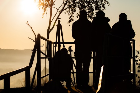 Silhouette of photographers on Bastei with sunshineの写真素材