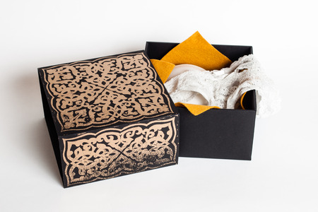Black and gold and purple underwear box with decorations and artistic signsの写真素材