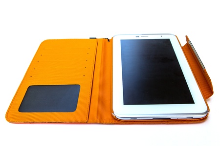 Tablet computer in orange caseの写真素材
