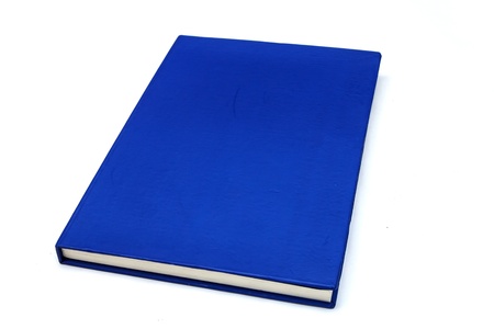 Isolated blue notebook on white backgroundの写真素材