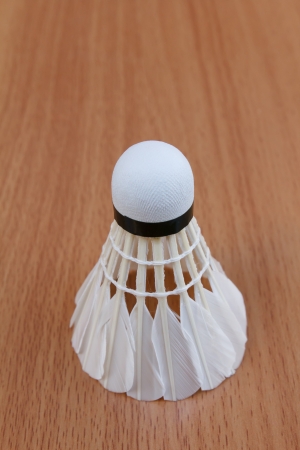 shuttlecock on wooden backgroundの写真素材