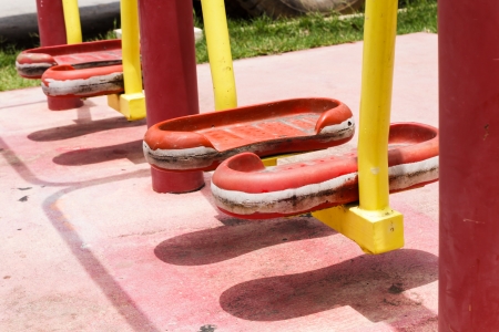 Empty chain swings on rural village playgroundの写真素材