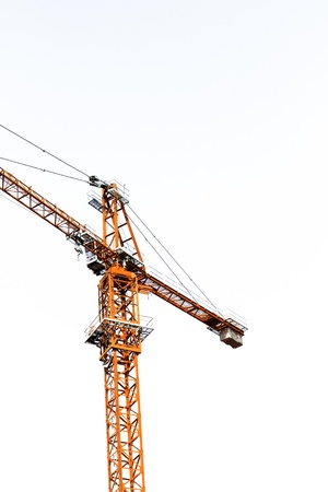 yellow crane car isolated with white backgroundの写真素材