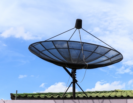 satellite dish against the blue skyの写真素材