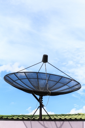 satellite dish against the blue skyの写真素材