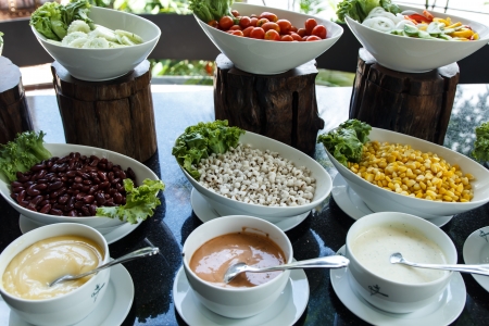 Vegetables salad bar on a counterの写真素材