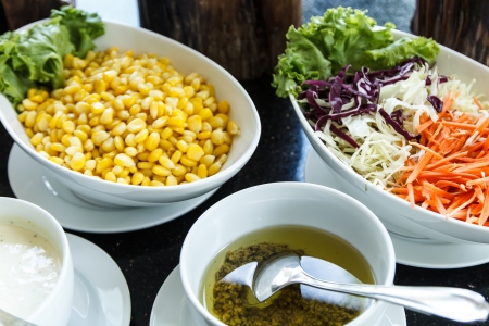 Vegetables salad bar on a counterの写真素材