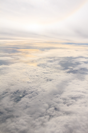 Golden cloud and sunlight, on the aircraft shotの写真素材
