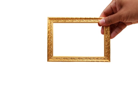 Hand show the gold frame on the white backgroundの写真素材