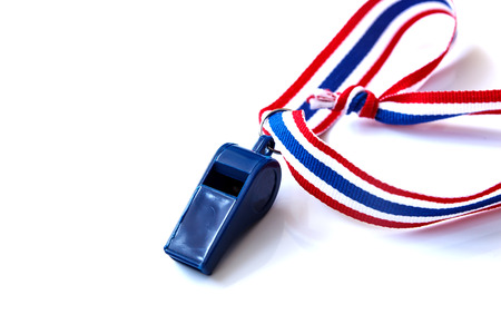 Blue whistle isolated on the white backgroundの写真素材
