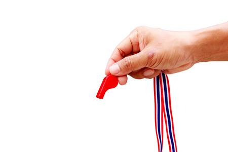 Man hand as action of put the red whistleの写真素材