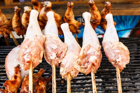 Fresh legs chicken on fireの写真素材