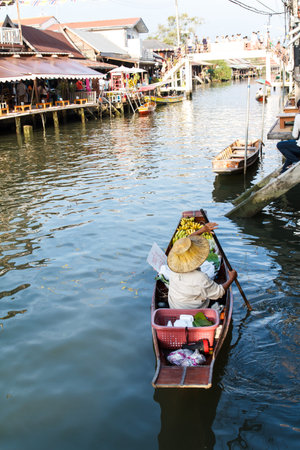 Seller woman in the boat at floating market, Thailand-2