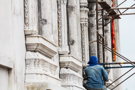 Construction worker working at the temple-2の写真素材
