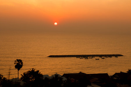 View of sunrise and small boat view, Thailandの写真素材