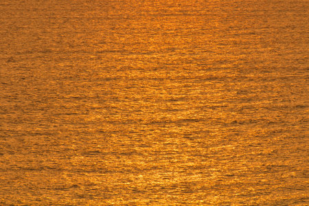 Background of reflection of sunlight on the seaの写真素材