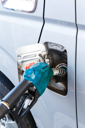 The machine with fuel fill with diesel oil at a stationの写真素材
